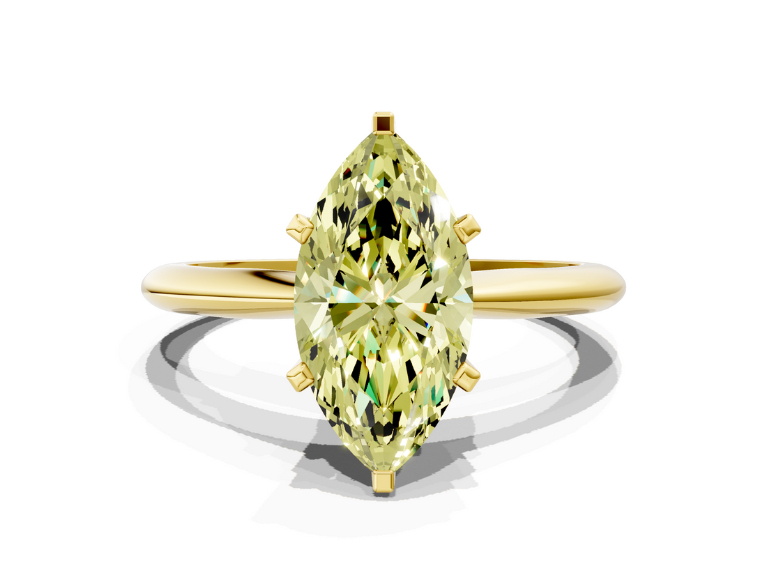 Yellow gold Fancy Yellow Marquise  Cut Solitaire Ring with Four-Prong Setting on a Classic Band