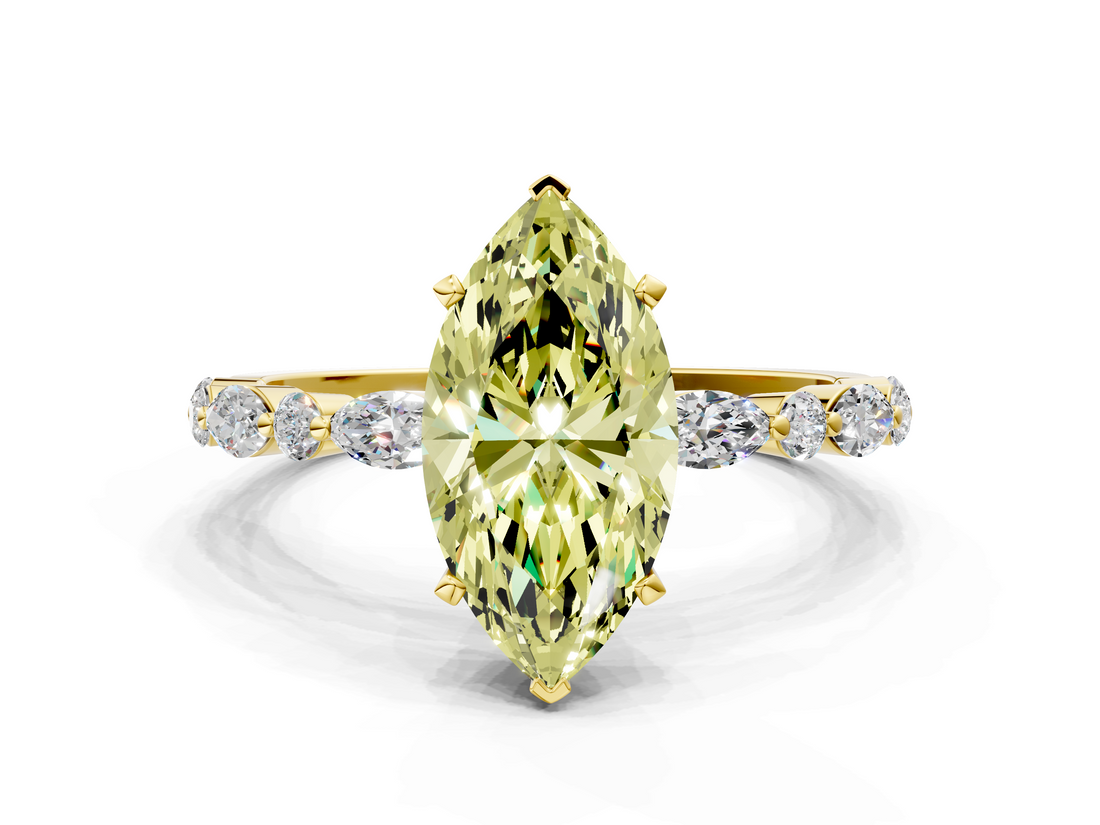 Yellow gold Fancy Yellow Marquise  Solitaire with Side Stones on a Pavé Band and Four-Prong Setting