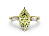 Yellow gold Fancy Yellow Marquise  Solitaire with Tapered Baguette Side Stones on a Classic Band with Four-Prong Setting