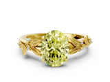 Yellow gold Fancy Yellow Oval  Brilliant Solitaire with Leaf Motif Band and Four-Prong Setting_62