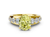 Yellow gold Fancy Yellow Oval  Brilliant Solitaire with Side Stones on a Pave Band and Four-Prong Setting_24