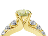 Yellow gold Fancy Yellow Oval  Brilliant Solitaire with Side Stones on a Pave Band and Four-Prong Setting_28