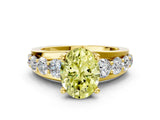 Yellow gold Fancy Yellow Oval  Brilliant Solitaire with Side Stones on a Pave Band and Four-Prong Setting_37