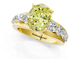 Yellow gold Fancy Yellow Oval  Brilliant Solitaire with Side Stones on a Pave Band and Four-Prong Setting_38