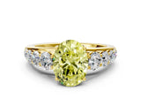 Yellow gold Fancy Yellow Oval Cut Brilliant Diamond Pavé Band with Six-Prong Setting