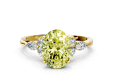 Yellow gold Fancy Yellow Oval Cut Brilliant Diamond Solitaire Ring with Pear Side Stones and Four-Prong Setting_3