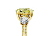 Yellow gold Fancy Yellow Oval Cut Brilliant Three-Stone Diamond Ring with Pavé Band and Four-Prong Setting_8