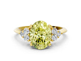 Yellow gold Fancy Yellow Oval Cut Cut Diamond Cluster Ring with Solitaire Band and Four-Prong Setting