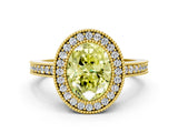 Yellow gold Fancy Yellow Oval Cut-Cut Diamond Halo Engagement Ring with Pave Band and Prong Setting