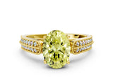 Yellow gold Fancy Yellow Oval Cut Cut Pave Split Shank Engagement Ring with Four-Prong Setting