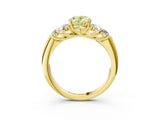 Yellow gold Fancy Yellow Oval  Cut Diamond Cluster Ring with Round Accent Stones and Prong Setting on a Classic Band_51
