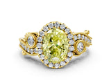 Yellow gold Fancy Yellow Oval Cut Diamond Halo Ring with Milgrain Pavé Band and Four-Prong Setting_54
