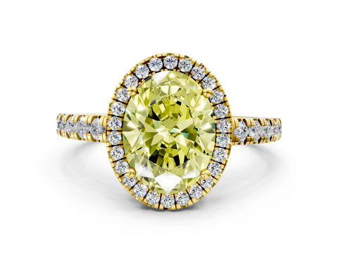 Yellow gold Fancy Yellow Oval Cut Diamond Halo Ring with Pavé Band and Four-Prong Setting