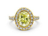 Yellow gold Fancy Yellow Oval Cut Diamond Halo Ring with Pavé Band and Prong Setting