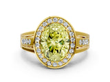 Yellow gold Fancy Yellow Oval Cut Diamond Halo Ring with Split Shank and Bezel Accents and Prong Setting