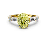 Yellow gold Fancy Yellow Oval  Cut Diamond Ring with Baguette Side Stones, Channel Set Band, and Four-Prong Setting_24