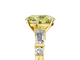 Yellow gold Fancy Yellow Oval  Cut Diamond Ring with Baguette Side Stones, Channel Set Band, and Four-Prong Setting_29