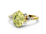 Yellow gold Fancy Yellow Oval Cut Diamond Ring with Side Stones and Four-Prong Setting_147
