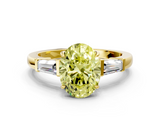 Yellow gold Fancy Yellow Oval  Cut Diamond Ring with Tapered Baguette Side Stones in Four-Prong Setting_3
