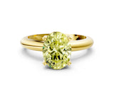 Yellow gold Fancy Yellow Oval Cut Diamond Solitaire Engagement Ring with Round Band and Four-Prong Setting_157