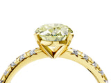 Yellow gold Fancy Yellow Oval Cut Diamond Solitaire Pavé Engagement Ring with Round Band and Prong Setting_71