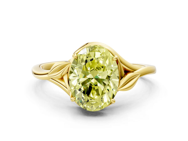 Yellow gold Fancy Yellow Oval Cut Diamond Solitaire Ring with Twist Band and Four-Prong Setting