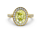 Yellow gold Fancy Yellow Oval Cut Halo Diamond Engagement Ring with Split Shank Band and Four-Prong Setting