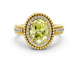 Yellow gold Fancy Yellow Oval Cut Halo Diamond Ring with Beaded Split Shank and Four-Prong Setting