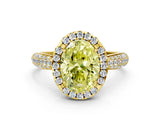 Yellow gold Fancy Yellow Oval Cut Halo Diamond Ring with Pavé Band
