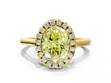 Yellow gold Fancy Yellow Oval Cut Halo Round Diamond Solitaire Ring with Pavé Band and Four-Prong Setting