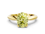 Yellow gold Fancy Yellow Oval  Cut Solitaire Engagement Ring with Tapered Band and Four-Prong Setting
