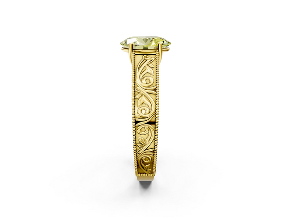 Yellow gold Fancy Yellow Oval Cut Diamond Solitaire Ring with Engraved Band and Four-Prong Setting