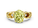 Yellow gold Fancy Yellow Oval Cut Solitaire Milgrain Leaf Band with Prong Setting