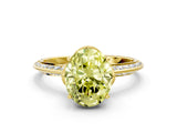 Yellow gold Fancy Yellow Oval Cut Solitaire Split Shank Pave Diamond Engagement Ring with Four-Prong Setting