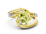 Yellow gold Fancy Yellow Oval Cut Solitaire Tension-Set Diamond Split Shank Ring