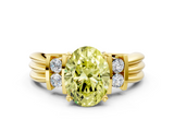 Yellow gold Fancy Yellow Oval  Cut Three-Stone Channel Set Ring with Bar Prongs_47