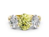 Yellow gold Fancy Yellow Oval Cut Three-Stone Diamond Ring with Prong Setting on a Classic Band_12