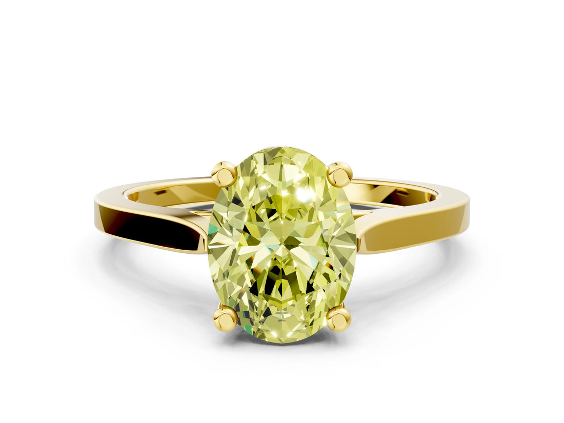 Yellow gold Fancy Yellow Oval  Solitaire Diamond Ring with Four-Prong Setting and Tapered Band