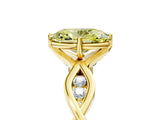 Yellow gold Fancy Yellow Oval  Solitaire Twist Band with Leaf Prong Setting