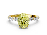 Yellow gold Fancy Yellow Oval  Solitaire with Side Stones on a Pavé Band and Four-Prong Setting_23