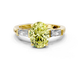 Yellow gold Fancy Yellow Oval  Solitaire with Tapered Baguette Side Stones on a Classic Band with Four-Prong Setting_107