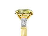Yellow gold Fancy Yellow Oval  Solitaire with Tapered Baguette Side Stones on a Classic Band with Four-Prong Setting_112