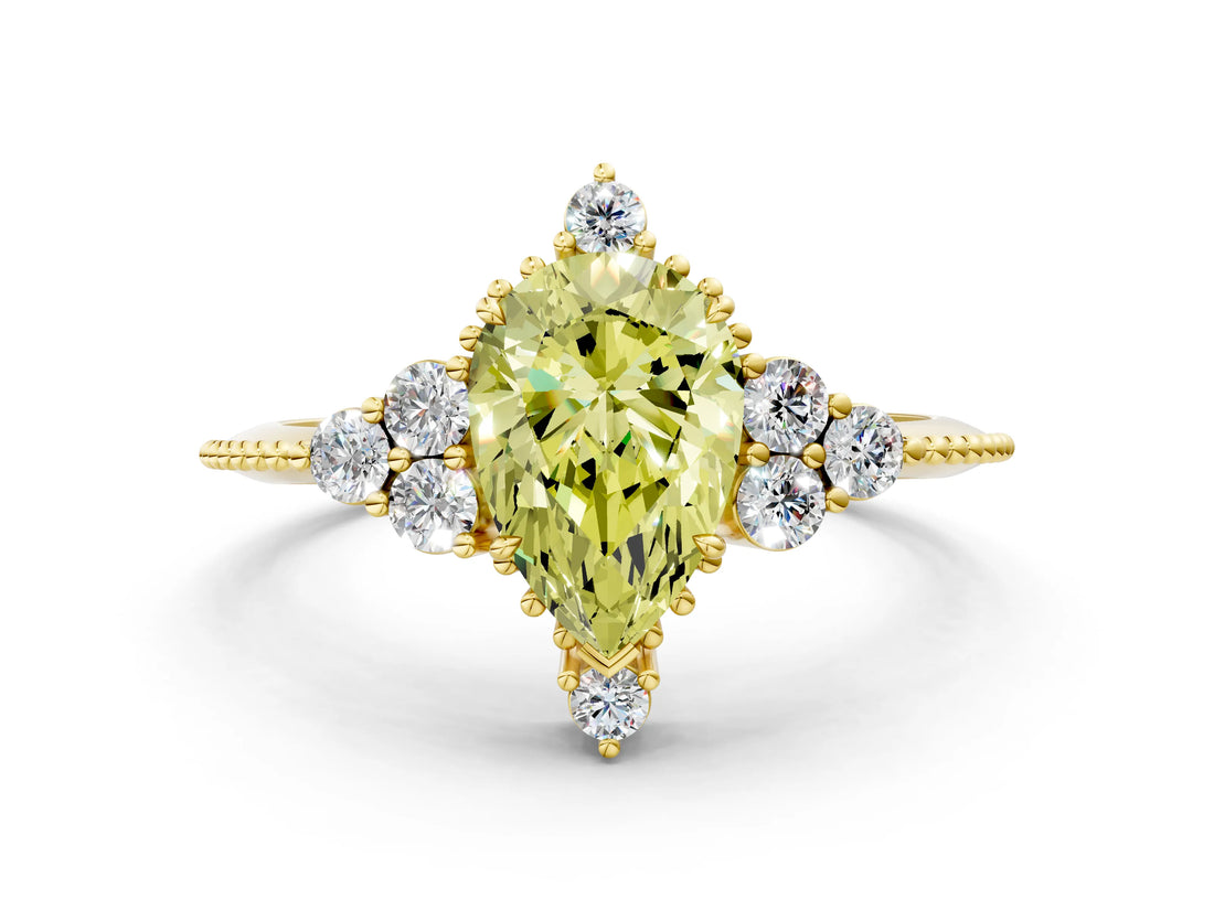 Yellow gold Fancy Yellow Pear Cut Brilliant Diamond with Cluster Setting on a Beaded Band and Four-Prong Setting