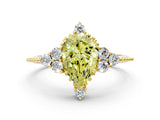 Yellow gold Fancy Yellow Pear Cut Brilliant Diamond with Cluster Setting on a Beaded Band and Four-Prong Setting