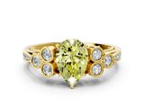 Yellow gold Fancy Yellow Pear  Cut Diamond Engagement Ring with Bezel Set Round Side Stones and Prong Setting_53