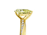 Yellow gold Fancy Yellow Pear Cut Diamond Engagement Ring with Side Stone Accents and Four-Prong Setting_17