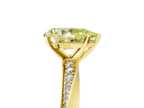 Yellow gold Fancy Yellow Pear Cut Diamond Engagement Ring with Side Stone Accents and Four-Prong Setting_65