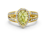 Yellow gold Fancy Yellow Pear Cut Diamond Halo Ring with Split Shank Pavé Band and Four-Prong Setting