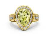 Yellow gold Fancy Yellow Pear Cut Diamond Halo Ring with Split Shank and Bezel Accents and Prong Setting