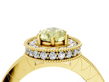 Yellow gold Fancy Yellow Pear Cut Diamond Milgrain Halo Engagement Ring with Round Pavé Band and Prong Setting_16